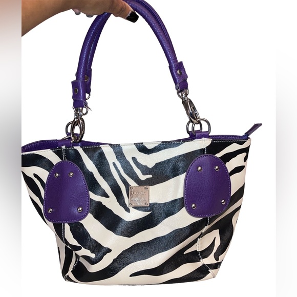 Dooney & Bourke Handbags - Dooney & Bourke Zebra Pattern Purse with Purple Trim